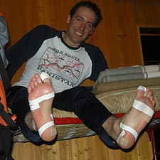 Damien's taped feet